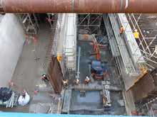 Load image into Gallery viewer, Layher Allround Scaffolding built by North Shore Scaffolding underneath Lower Queen Street, between Central Post Office (Britomart Station) and H&M, as part of the City Rail Link (CRL).