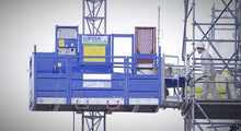 Load image into Gallery viewer, Geda 1200 Hoist being loaded on a construction site
