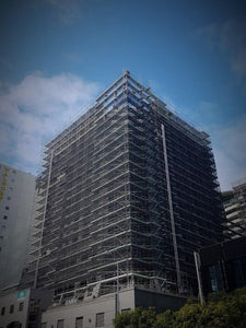 The International Apartments under construction with scaffolding